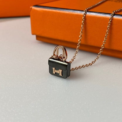 ¡®Aura Jewels¡¯CONSTANCE BLACK PEDANT PINK GOLD NECKLACE
