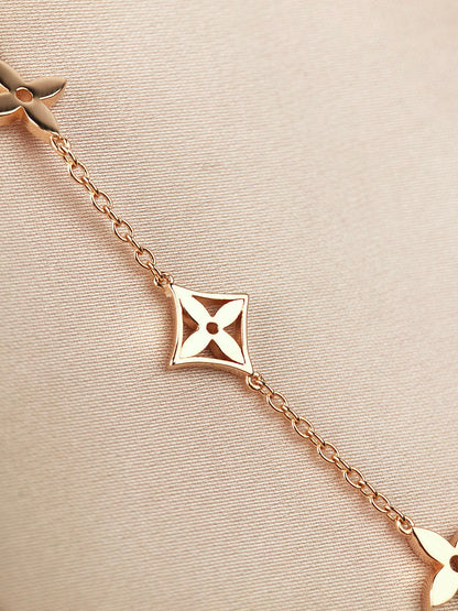 ¡®Aura Jewels¡¯STAR AND SUN 7 MOTIFS GOLD BRACELET