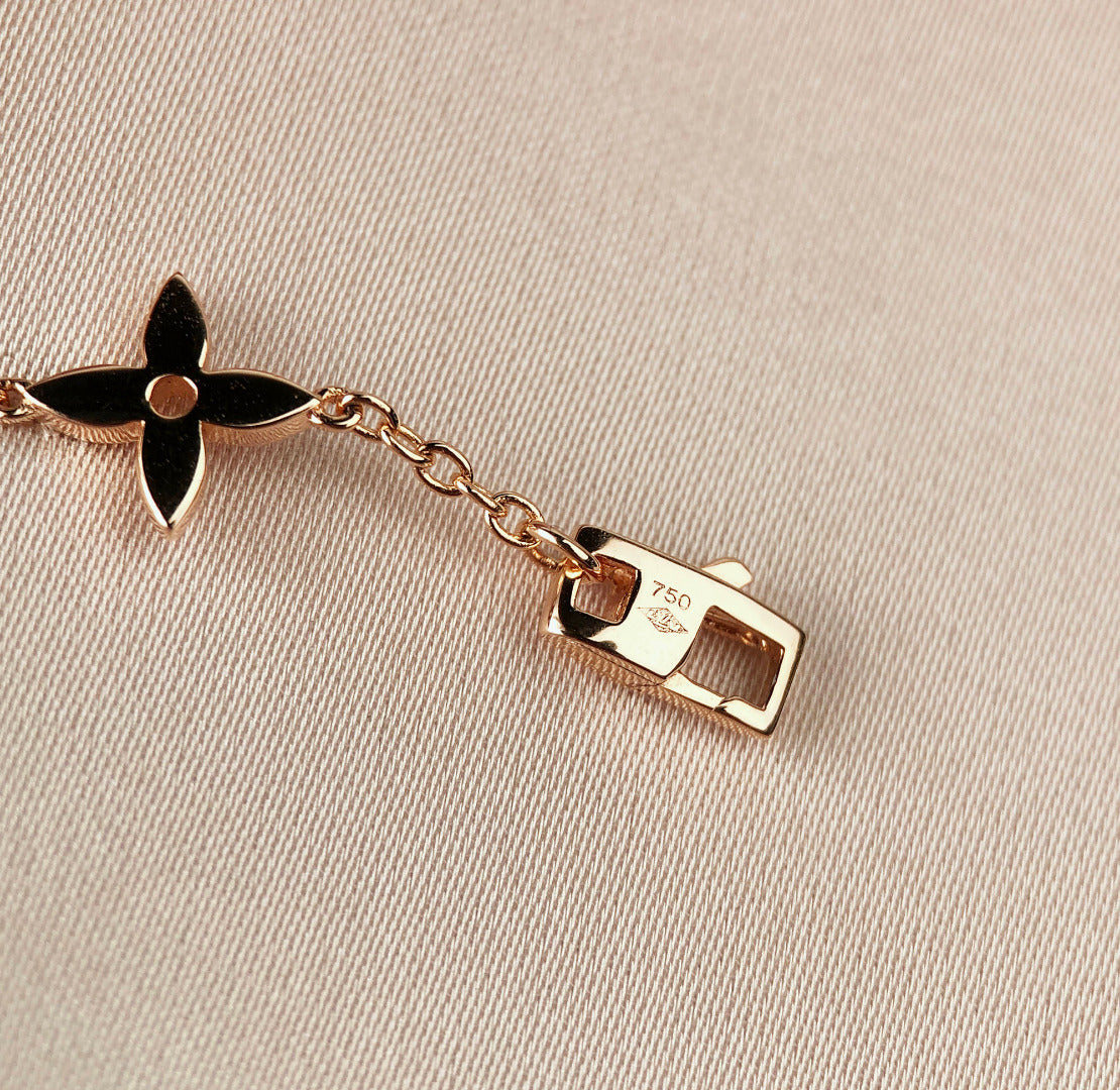 ¡®Aura Jewels¡¯STAR AND SUN 7 MOTIFS GOLD BRACELET