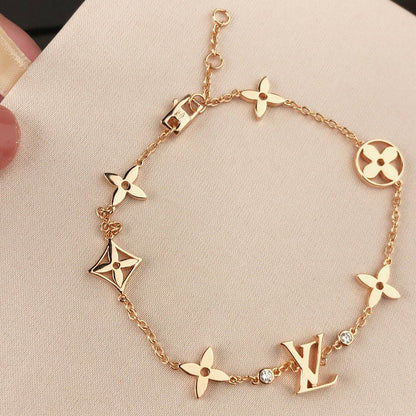 ¡®Aura Jewels¡¯STAR AND SUN 7 MOTIFS GOLD BRACELET