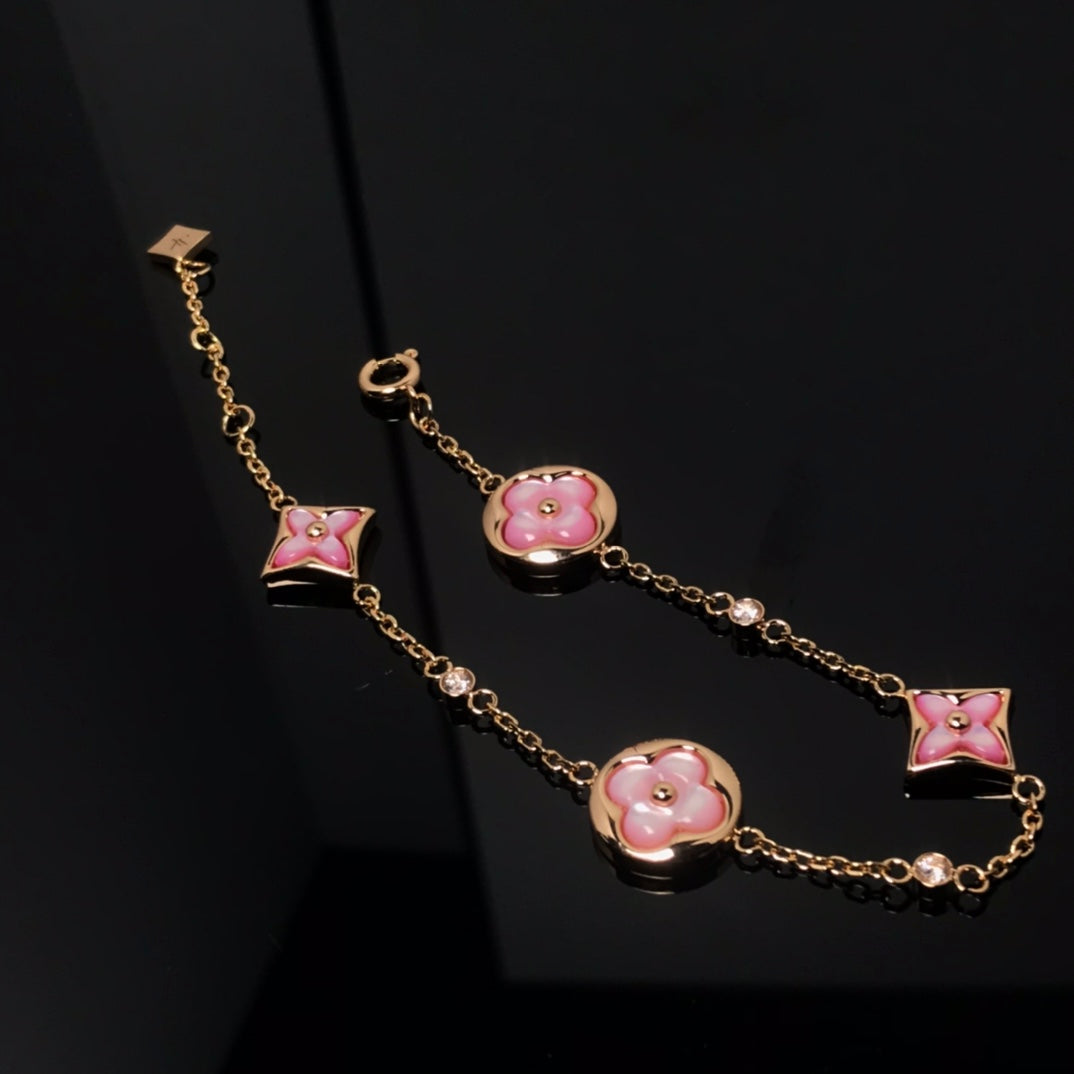 ¡®Aura Jewels¡¯STAR AND SUN 4 MOTIF PINK MOP PINK GOLD BRACELET