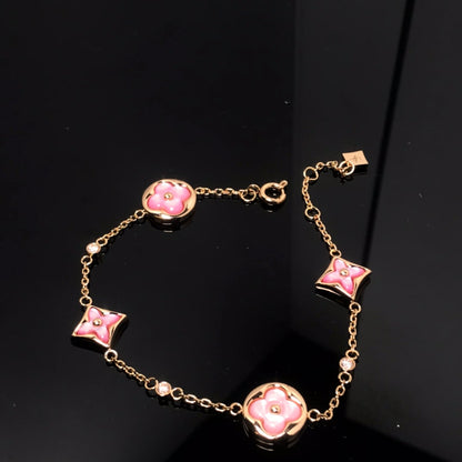 ¡®Aura Jewels¡¯STAR AND SUN 4 MOTIF PINK MOP PINK GOLD BRACELET