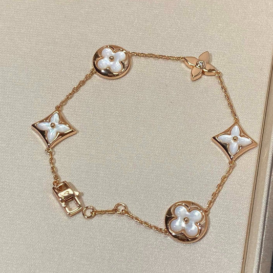 ¡®Aura Jewels¡¯STAR AND SUN 5 MOTIF MOP PINK GOLD BRACELET