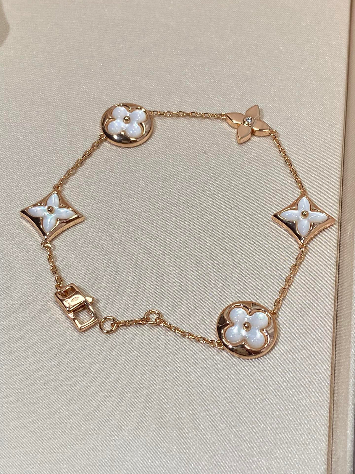 ¡®Aura Jewels¡¯STAR AND SUN 5 MOTIF MOP PINK GOLD BRACELET
