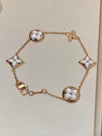 ¡®Aura Jewels¡¯STAR AND SUN 5 MOTIF MOP PINK GOLD BRACELET