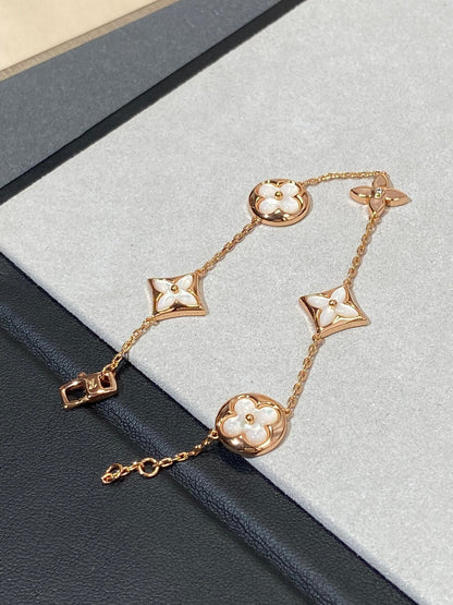 ¡®Aura Jewels¡¯STAR AND SUN 5 MOTIF MOP PINK GOLD BRACELET