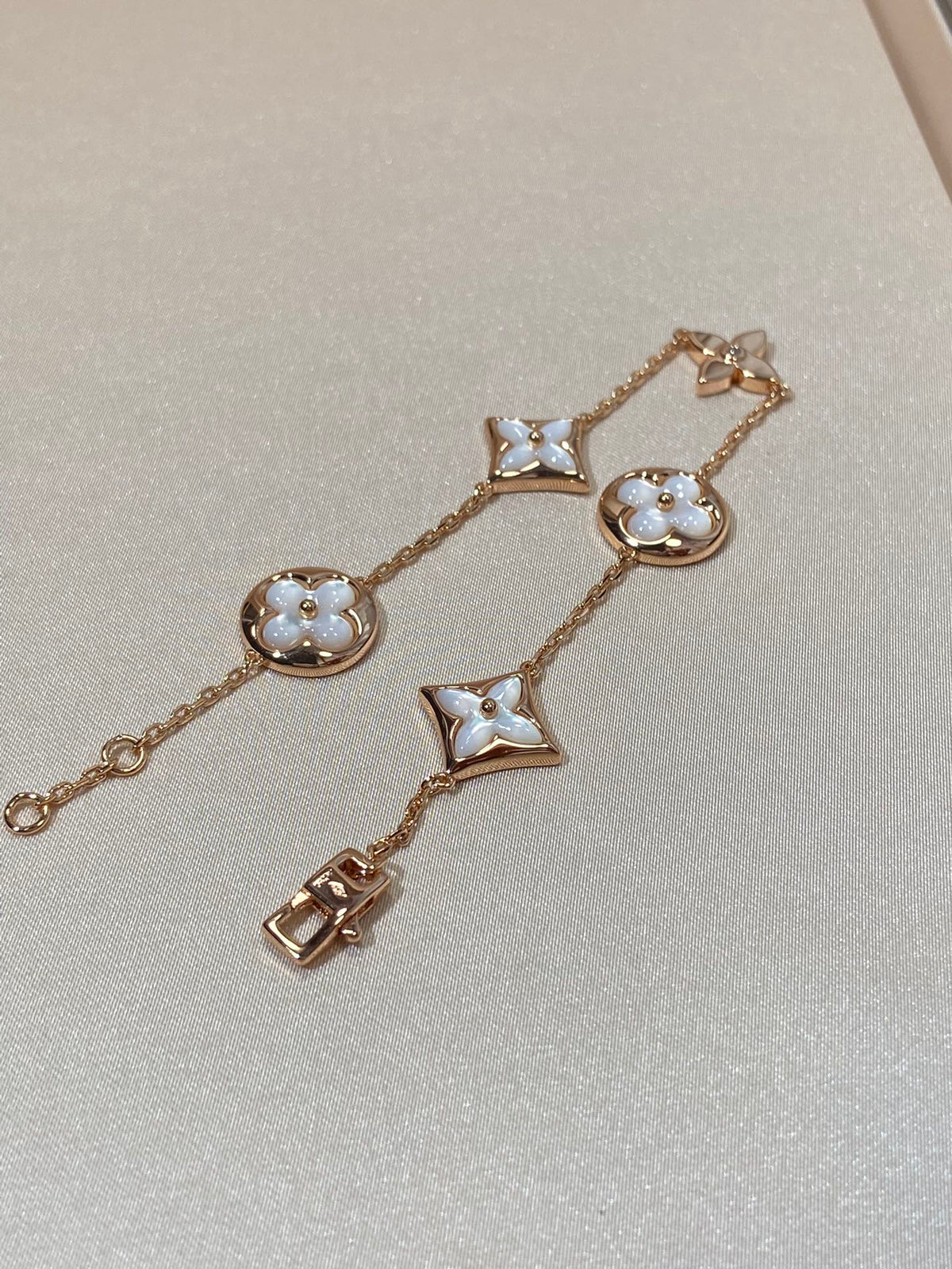 ¡®Aura Jewels¡¯STAR AND SUN 5 MOTIF MOP PINK GOLD BRACELET