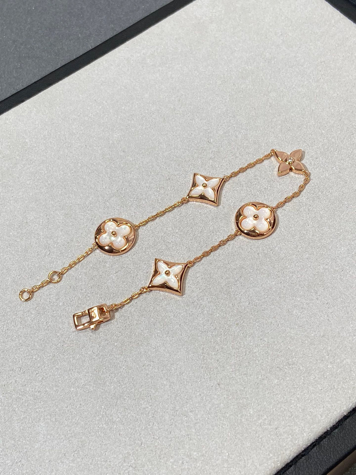 ¡®Aura Jewels¡¯STAR AND SUN 5 MOTIF MOP PINK GOLD BRACELET