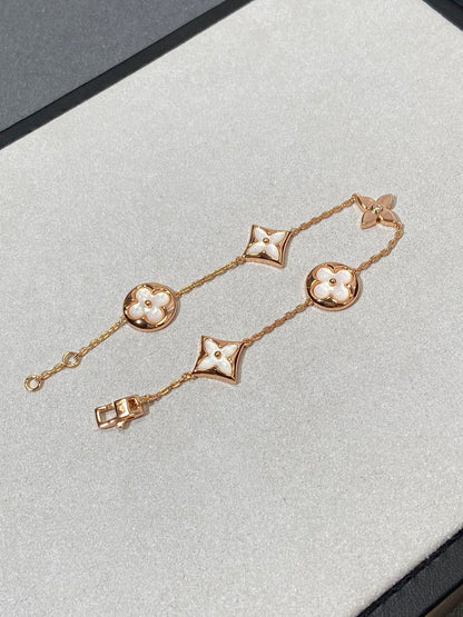 ¡®Aura Jewels¡¯STAR AND SUN 5 MOTIF MOP PINK GOLD BRACELET