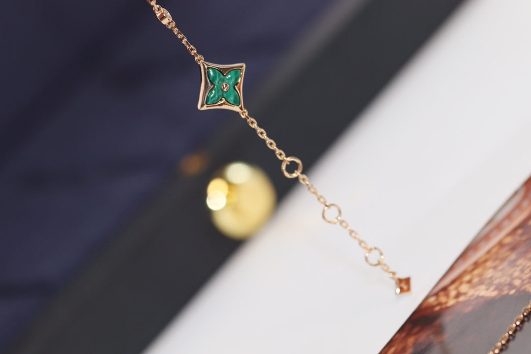 ¡®Aura Jewels¡¯STAR AND SUN 4 MOTIF PINK GOLD MALACHITE BRACELET