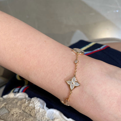 ¡®Aura Jewels¡¯STAR AND SUN 4 MOTIF WHITE MOP PINK GOLD BRACELET