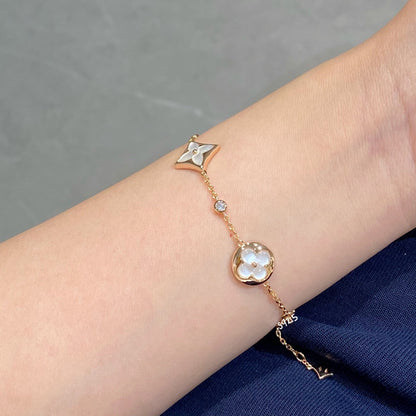 ¡®Aura Jewels¡¯STAR AND SUN 4 MOTIF WHITE MOP PINK GOLD BRACELET