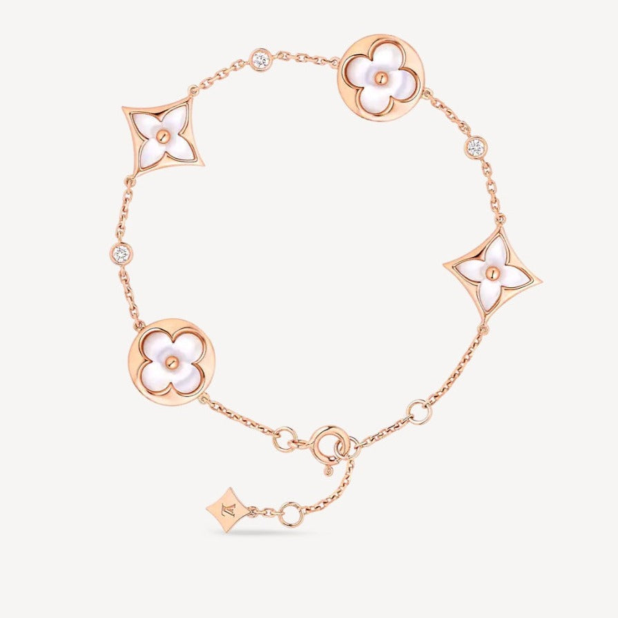 ¡®Aura Jewels¡¯STAR AND SUN 4 MOTIF WHITE MOP PINK GOLD BRACELET