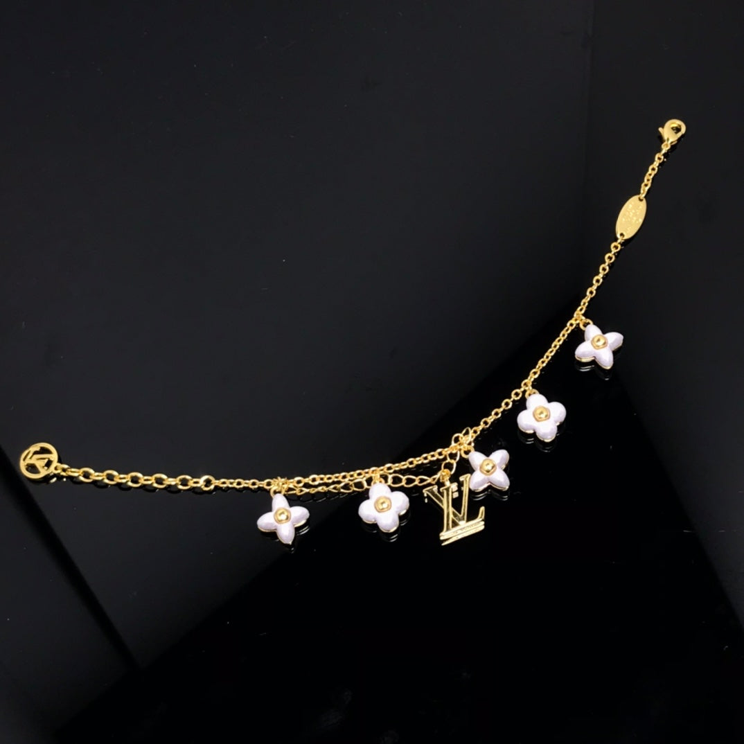 ¡®Aura Jewels¡¯LOGO 6 MOTIF STAR AND SUN GOLD BRACELET