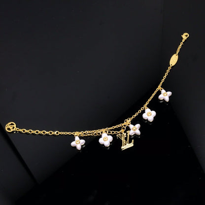 ¡®Aura Jewels¡¯LOGO 6 MOTIF STAR AND SUN GOLD BRACELET