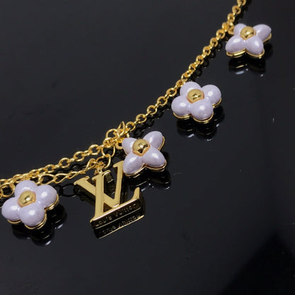 ¡®Aura Jewels¡¯LOGO 6 MOTIF STAR AND SUN GOLD BRACELET