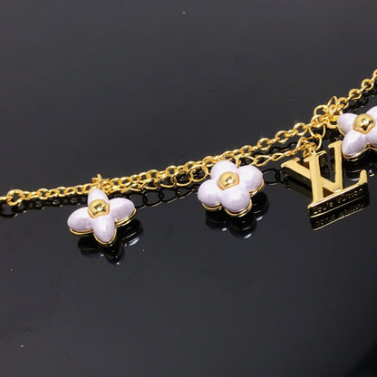 ¡®Aura Jewels¡¯LOGO 6 MOTIF STAR AND SUN GOLD BRACELET