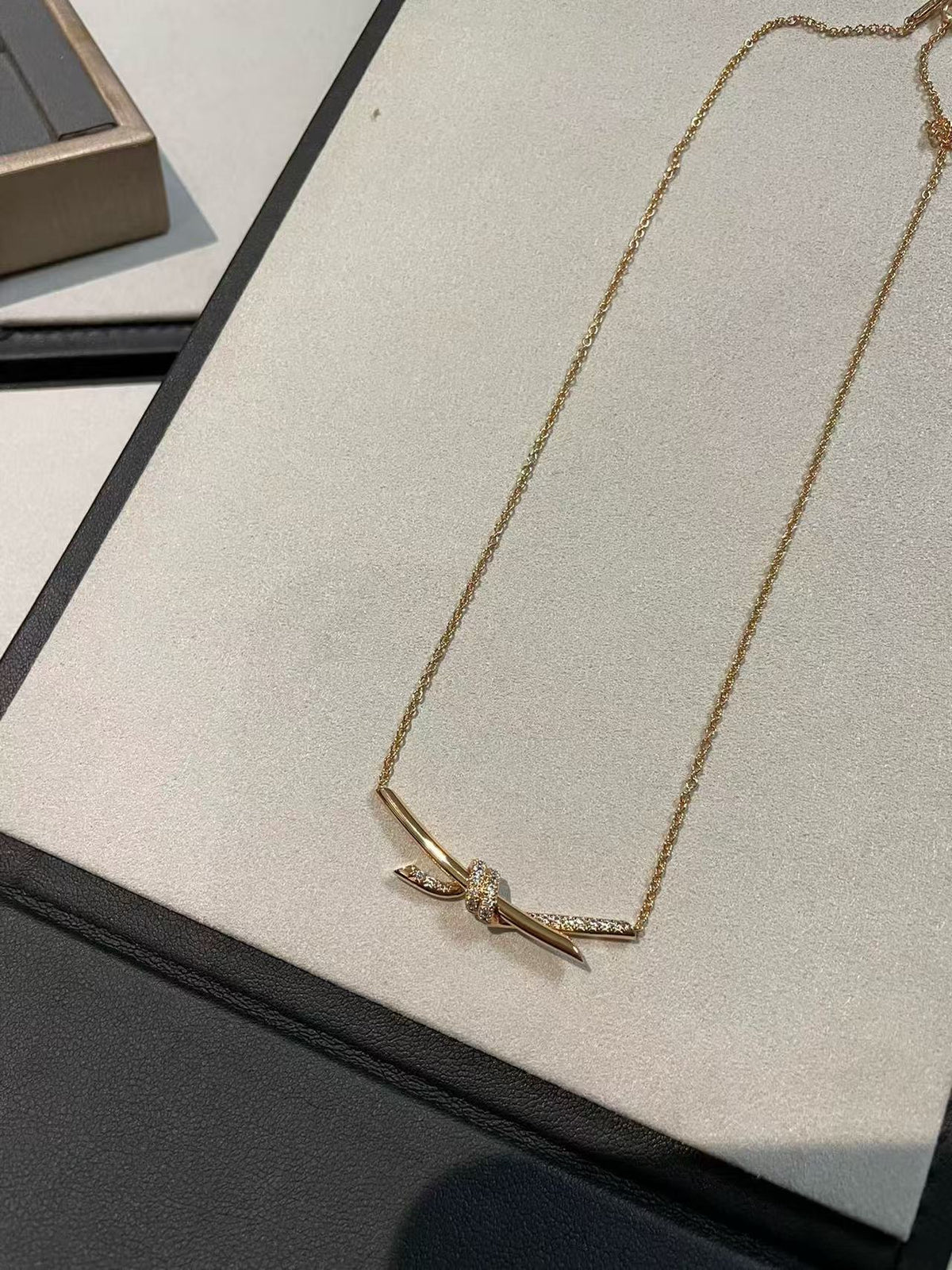 [Aura Jewels]T House Diamond-Studded Knot Necklace