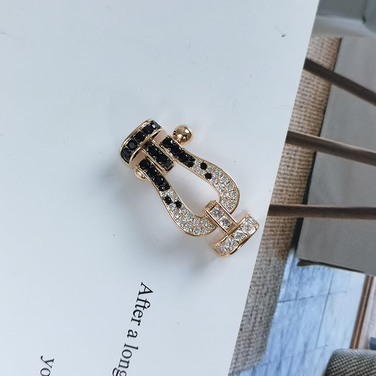 ¡®Aura Jewels¡¯FORCE LARGE HORSESHOE BLACK WHITE DIAMOND BRACELET SILVER