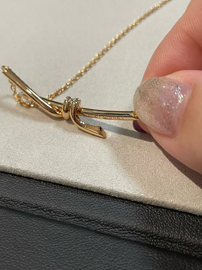 [Aura Jewels]T House Diamond-Studded Knot Necklace
