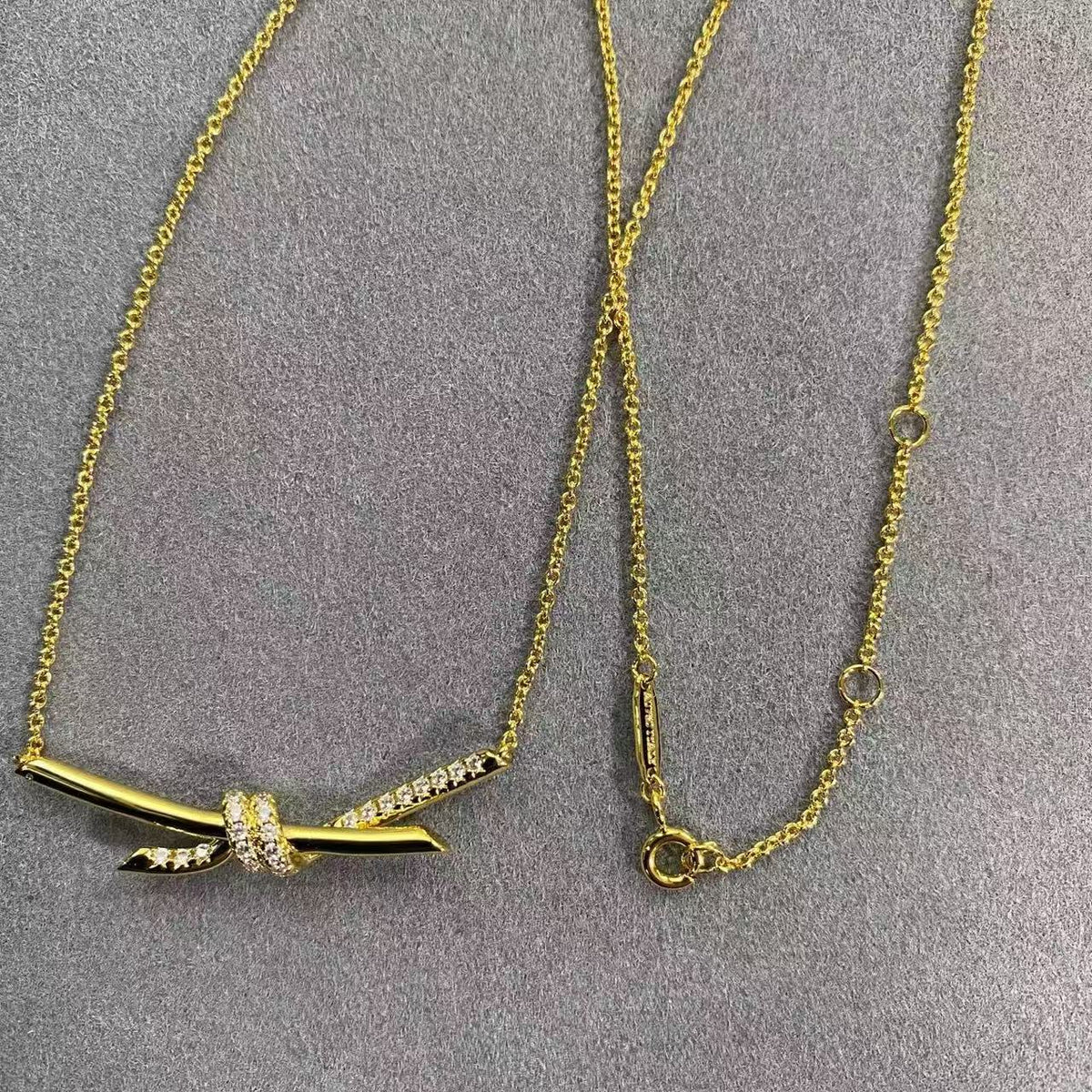 [Aura Jewels]T House Diamond-Studded Knot Necklace