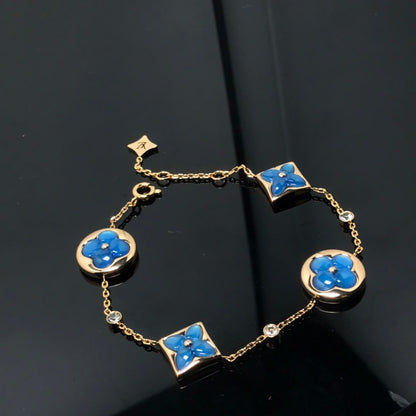 ¡®Aura Jewels¡¯STAR AND SUN 4 MOTIF BLUE BRACELET