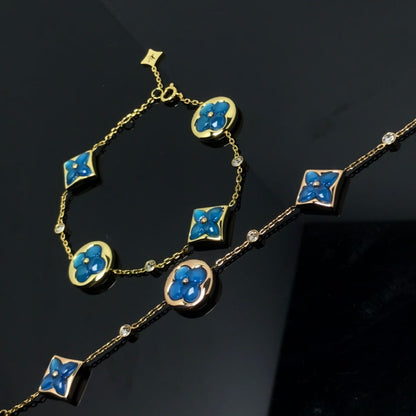 ¡®Aura Jewels¡¯STAR AND SUN 4 MOTIF BLUE BRACELET